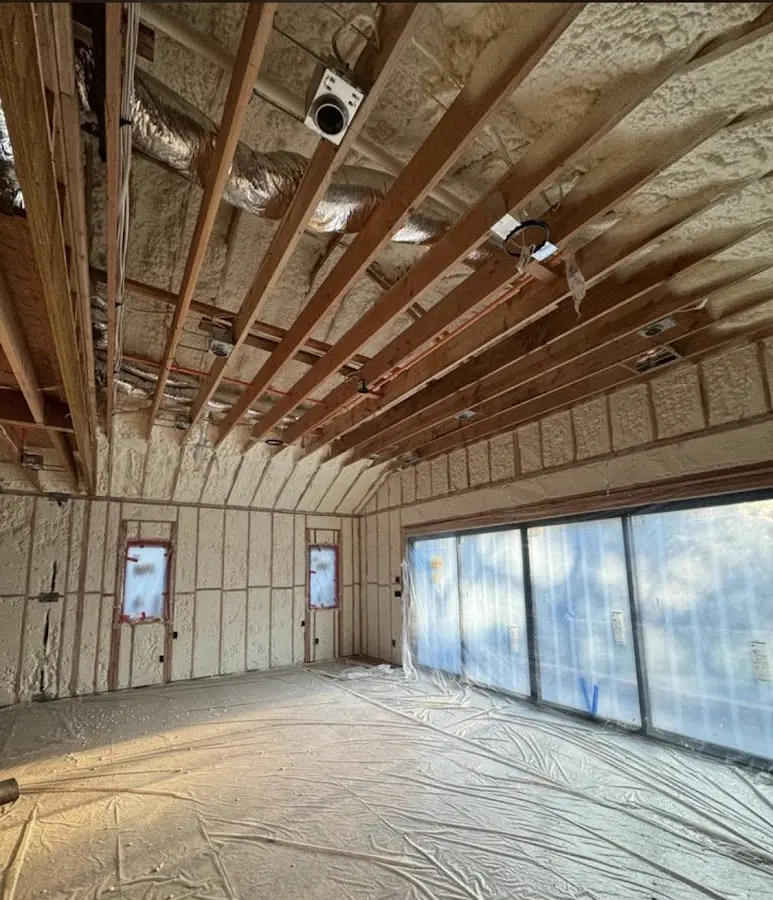 Interior walls and ceiling insulated with spray foam during new construction in Rockledge